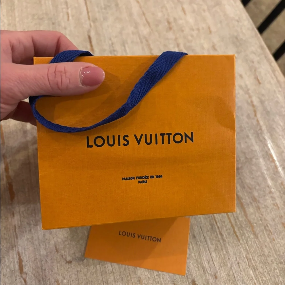 Louis Vuitton Vibrant Orange Bag with Blue Handles